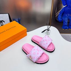 Woman’s pink Louis Vuitton Slides 