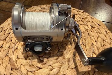 Daiwa Saltiga 40a with Tiburon Clamp and 1/2 spool of spectra