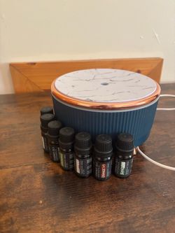Essential oil diffuser with oils