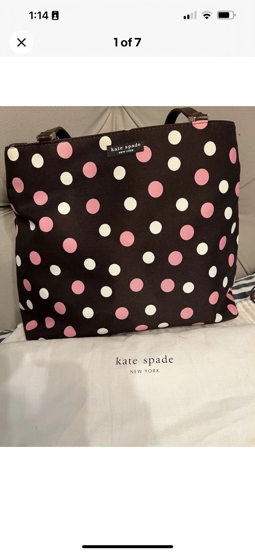 Kate Spade brown background polka dot fabric top handle handbag.