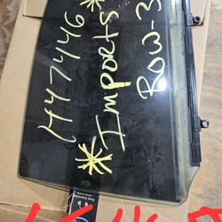 07 Lexus 460  Driver Rear Window