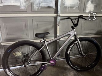 SE bike silver grey  w purple pedals