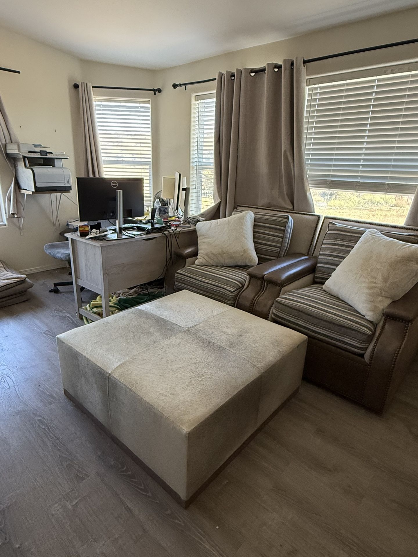 Paul Robert “Alan” Swivel Chairs and Ottoman