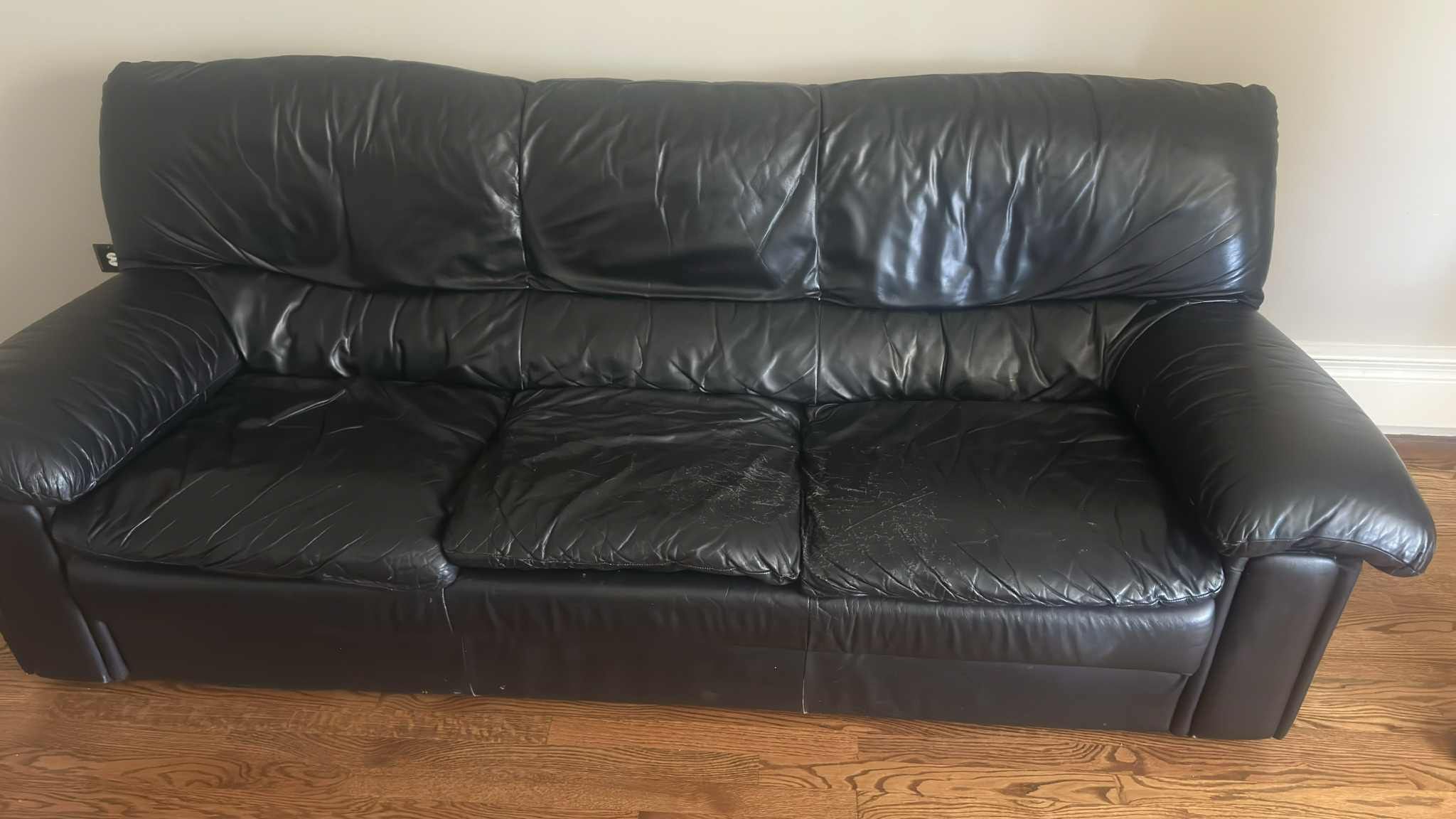 Leather couch And Old Dresser