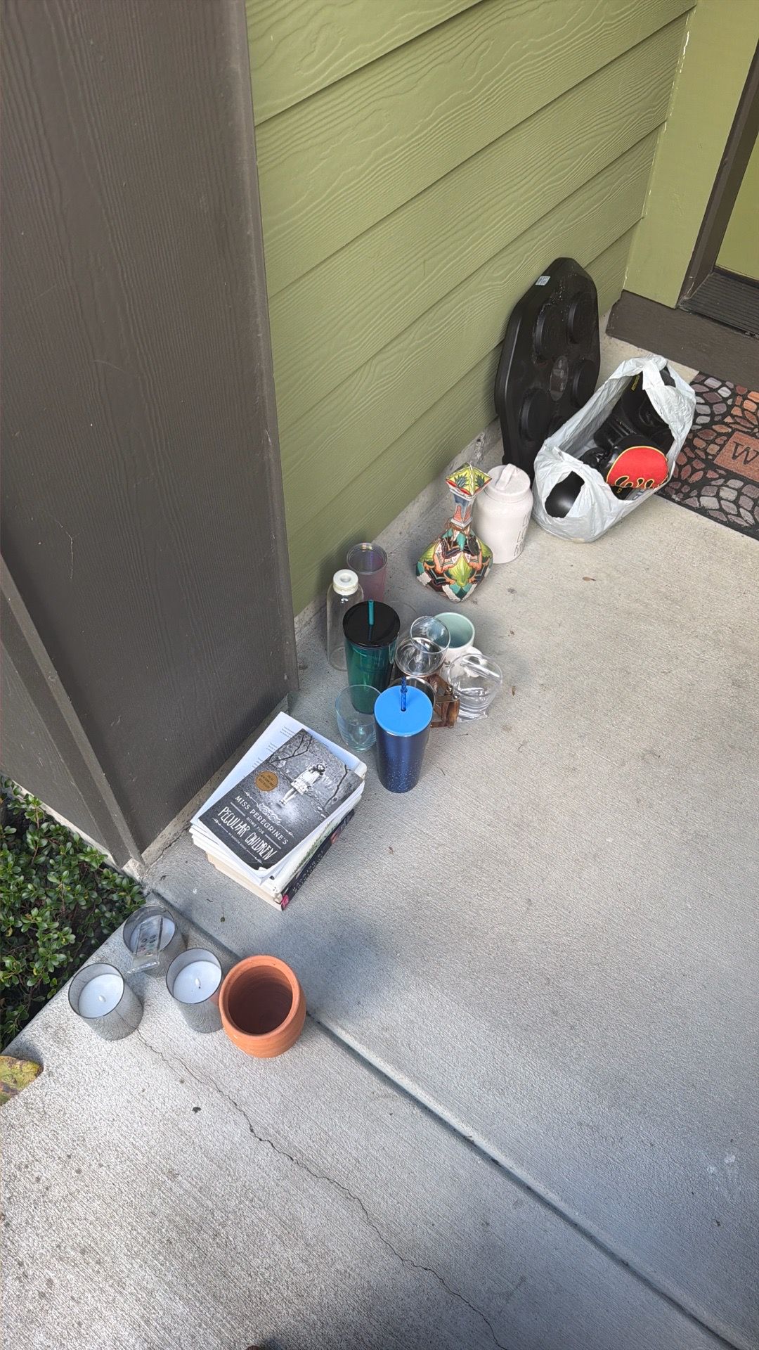 Free books, Starbucks cups with lids and boxing game on the porch