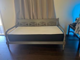 Twin bed bright new mattress.