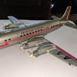 American Airlines DC-7 Battery Operated Airplane Made In Japan By Line mar Looking To Trade For A 727 Display Model Or Allyn Co Airplane Ashtray Model