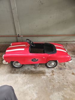 State Farm 90th Anniversary Pedal Car, modeled after a classic Mercedes-Benz 190SL.