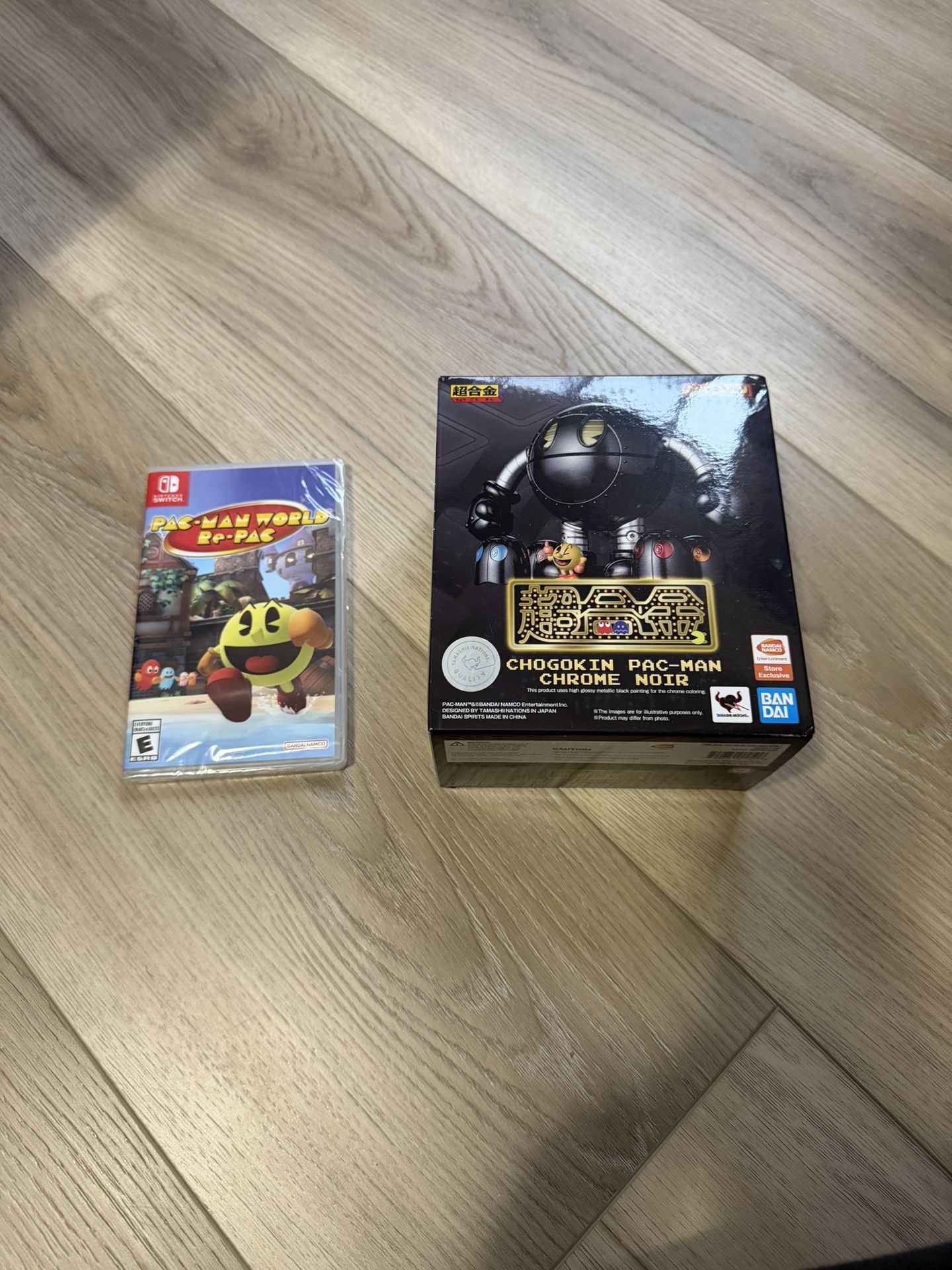 BanDai Chogokin Pac-Man Chrome Noir Exclusive Figure + Pac-Man Switch Game Bundle – $60