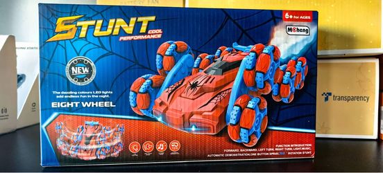 🕷️ Epic Stunts Await! MoCheng 8-Wheel Remote Control Sprayer Stunt Car (NO.TJ2045) 🚀