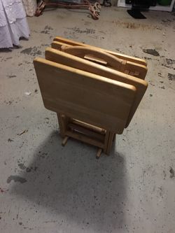 4 little tables with a stand