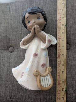 Brown praying angel