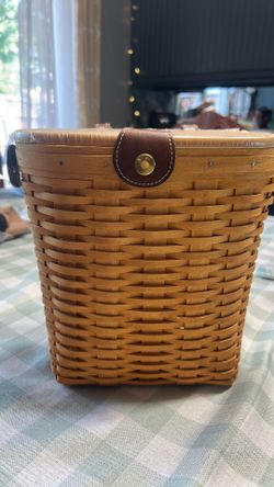 Longaberger classic purse with leather strap and leather larger hang tag. NEVER been used!  Plastic instead included as well