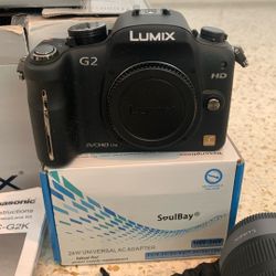 Panasonic DMC-G2 with 52mm Lens, Charger, Book And Battery