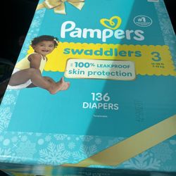 Pampers swaddle 2brand new Boxes One size 3, 136 count comes with two packs of sensitive pampers wipes, 56 in each pack Then A Second Box Of Pampers 4