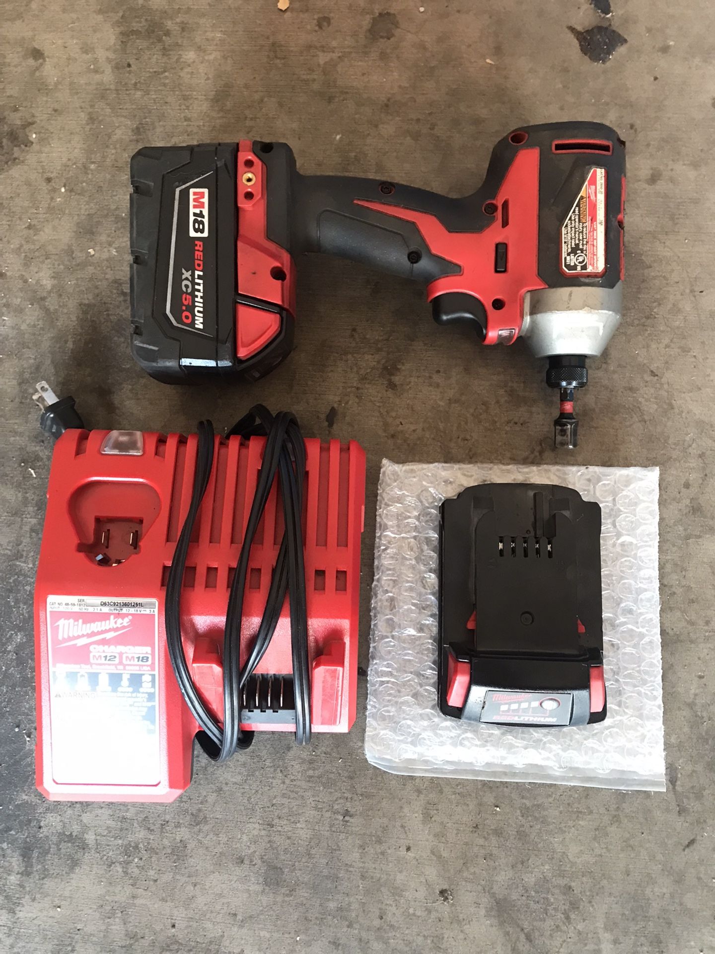Milwaukee M18 Drill Charger And Batteries