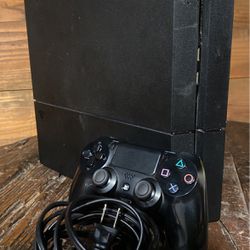 Used PS4 (comes with free game) 