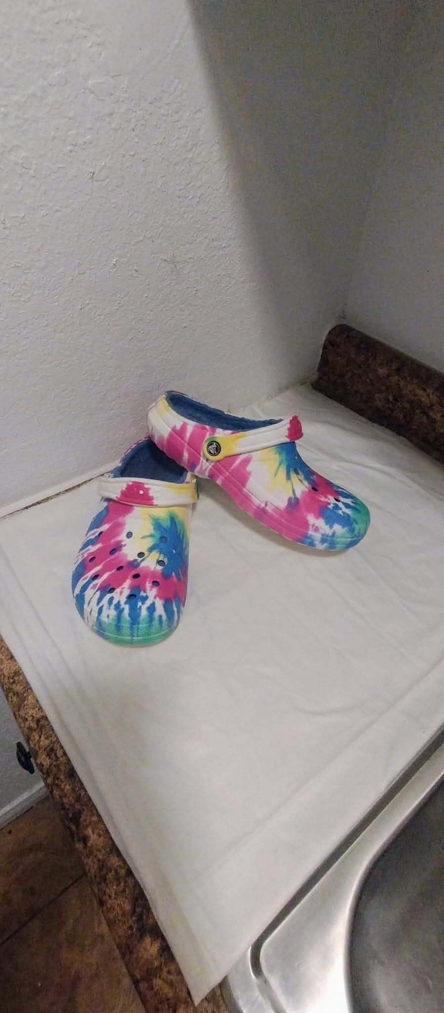 multi-colored croc shoes