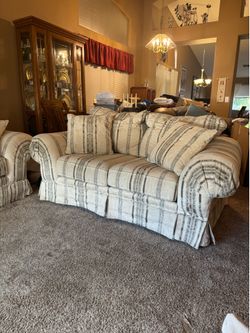 Cream couch and love seat