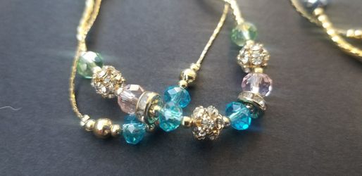 Gold plated bracelets with crystals