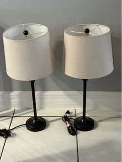 Set of two bronze table lamps