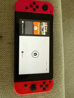 Nintendo Switch with Red Joy-Cons