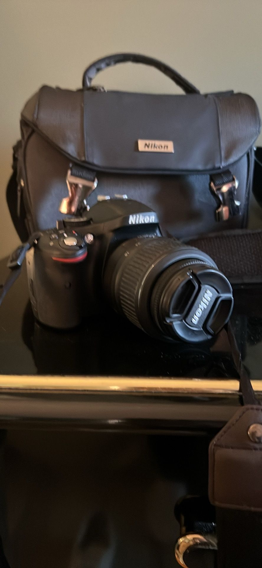 Nikon D5200 with Nikon DX 18-55mm lense Manfrotto Tripod