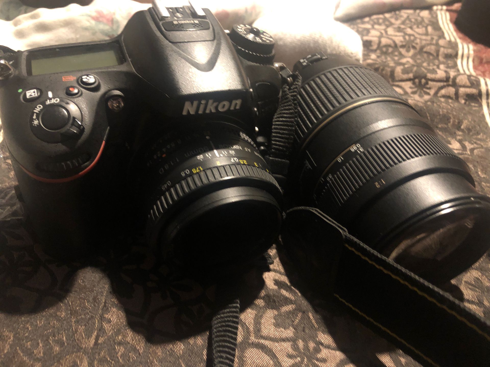 Nikon D7100 with Nikon 50 mm lens and Tamron 70-300 lens