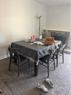 Jerome’s Dining Table with chairs and bench