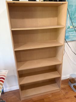 Dark mahogany and light walnut bookshelves