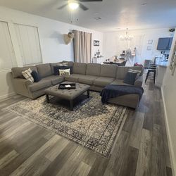 Couch, ottoman, rug