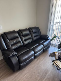 Ashley 3 seater couch recliner.