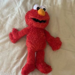 Laughing tickle me Elmo
