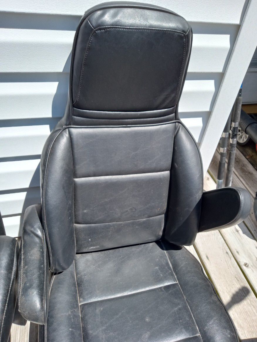 Two Leather Cabin Chairs With Armrest
