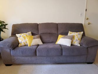 Ashley Furniture Charcoal Gray Sofa and Loveseat Set