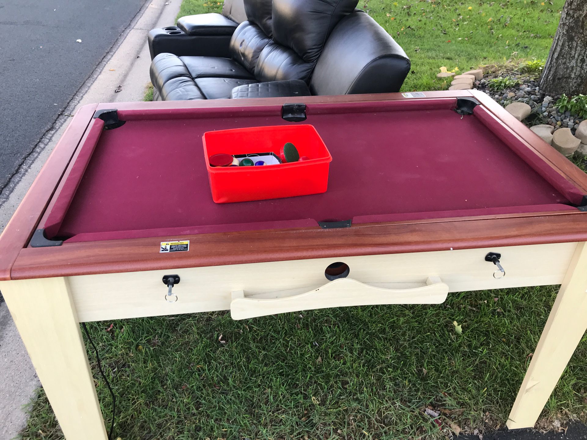 Mini pool table and on the other side air hockey