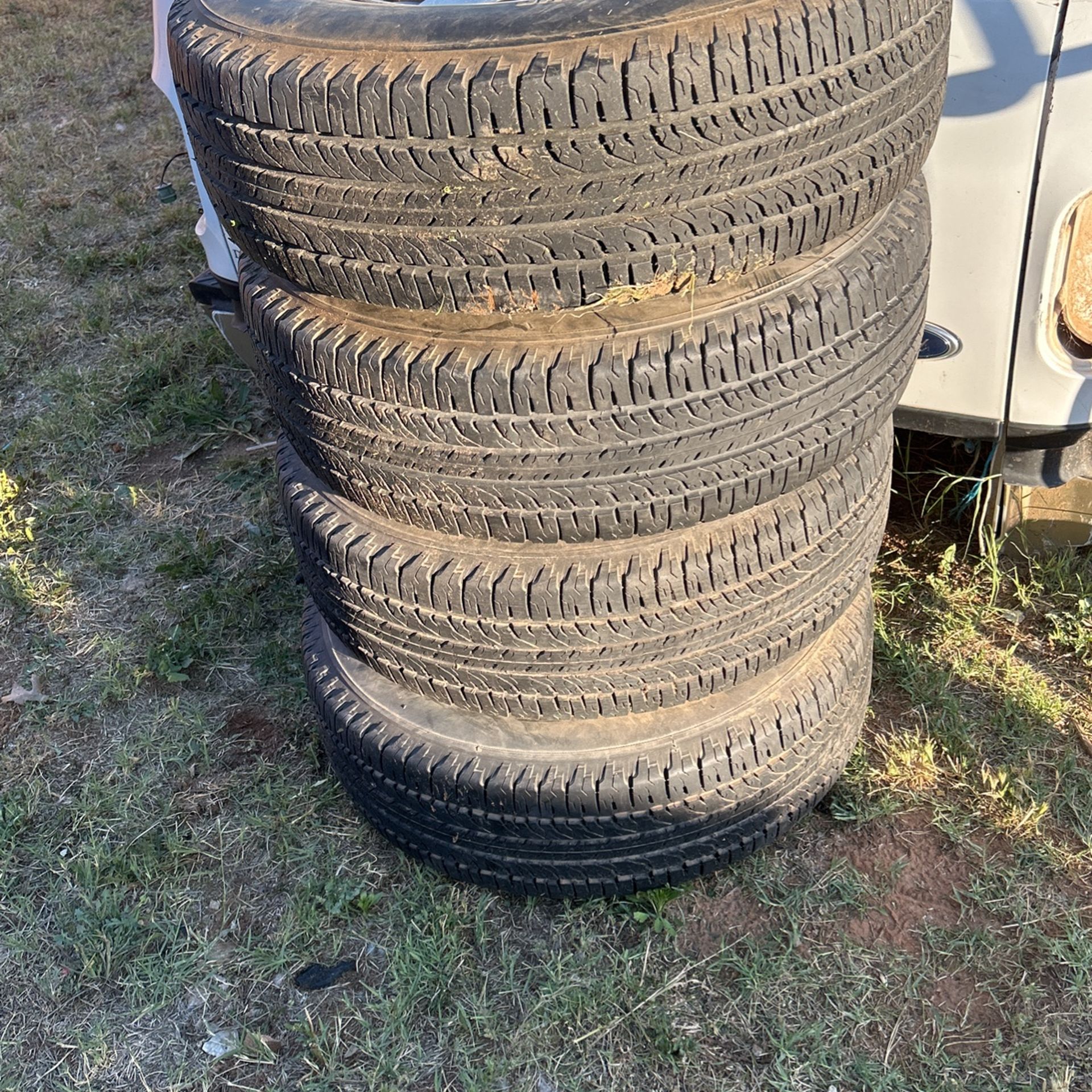 C1500 Five Lug P235/75r15 Original Rims And Tires for Sale in Midland