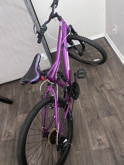 Mongoose Status 2.2 Mens and Womens Mountain Bike, 26-Inch Wheels, 21-Speed Shifters, Aluminum Frame, Front Suspension, Purple