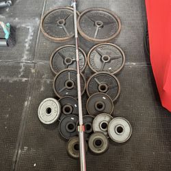 Ivanko Olympic weights 265lbs total plus 7ft 40lbs bar