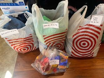 Bag of girls clothing size 8/10-$10, 2 Bags of women’s clothing size m/l-$20, bag of toys-$10. Higley and ray.