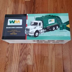 Waste Management  Freightliner With 2 Trash Carts