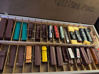 Old train set 61 cars includes 9 micro cars last I know all worked a year ago some in boxes in incredible condition lots tracks has  control box lots