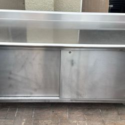 Advance Tabco CK-SS-366M 36" x 72" 14 Gauge Work Table with Cabinet Base and Mid Shelf - 5" Backsplash