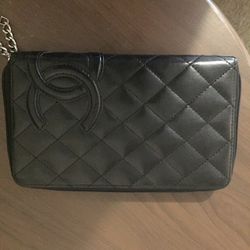 Black and pink Chanel wallet