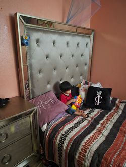 Queen bed with side table