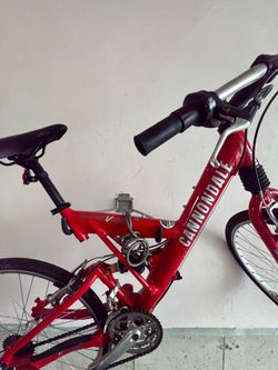 Red Cannondale Bicycle - good condition, suspension shock absorbers