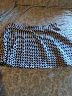 Black and white and a camel skirts
