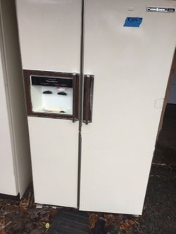 Side by side refrigerator/ 30 day warranty/ pick up for this price/ if I bring it , it’s regular price because it’s so heavy