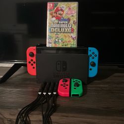 1st Gen. Nintendo Switch W Two additional Controllers & Mario Game