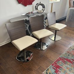 Roche Bobois Leather Swivel Chairs (3)